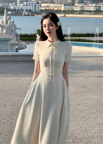 Cream Tuytsi Elastic Midi Dress_FL131.1_FLANE Brand_เดรสยาวสีครีม คอปกเยอรมัน และเข็มขัดโบว์ – ผ้าทูตซี่เกาหลีคุณภาพสูงยืดได้เล็กน้อย